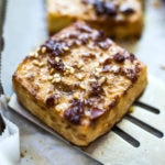 How to make Baked Tofu! A delicious source of plant-based protein perfect for salads, spring rolls, Buddha bowls, or served with a side of veggies! Vegan and Gluten-Free adaptable. | www.feastingathome.com