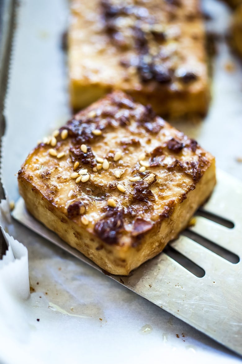 Baked Tofu with 3 Marinades! Never have bland tofu again, with these three variations - Sesame Ginger Miso, Spicy Mexican Tofu and BBQ Tofu. Simple, vegan and easy recipes! Great for meal prep! #bakedtofu #tofumarinade #tofu #howtocooktofu #crispytofu 