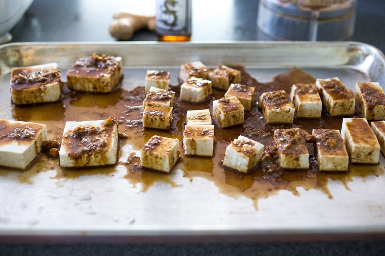 marinaded tofu on a sheet pan. 