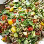 Farro Tabbouleh Salad with tomatoes, cucumber, fresh herbs and a simple lemon dressing. | www.feastingathome.com