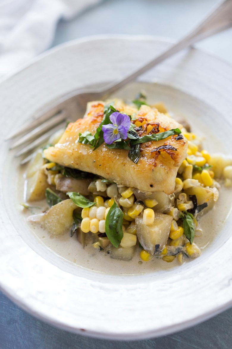 Summer Corn Chowder with Basil and White Fish- a light and fresh summery dinner that can be made in under 30 minutes. | www.feastingathome.com