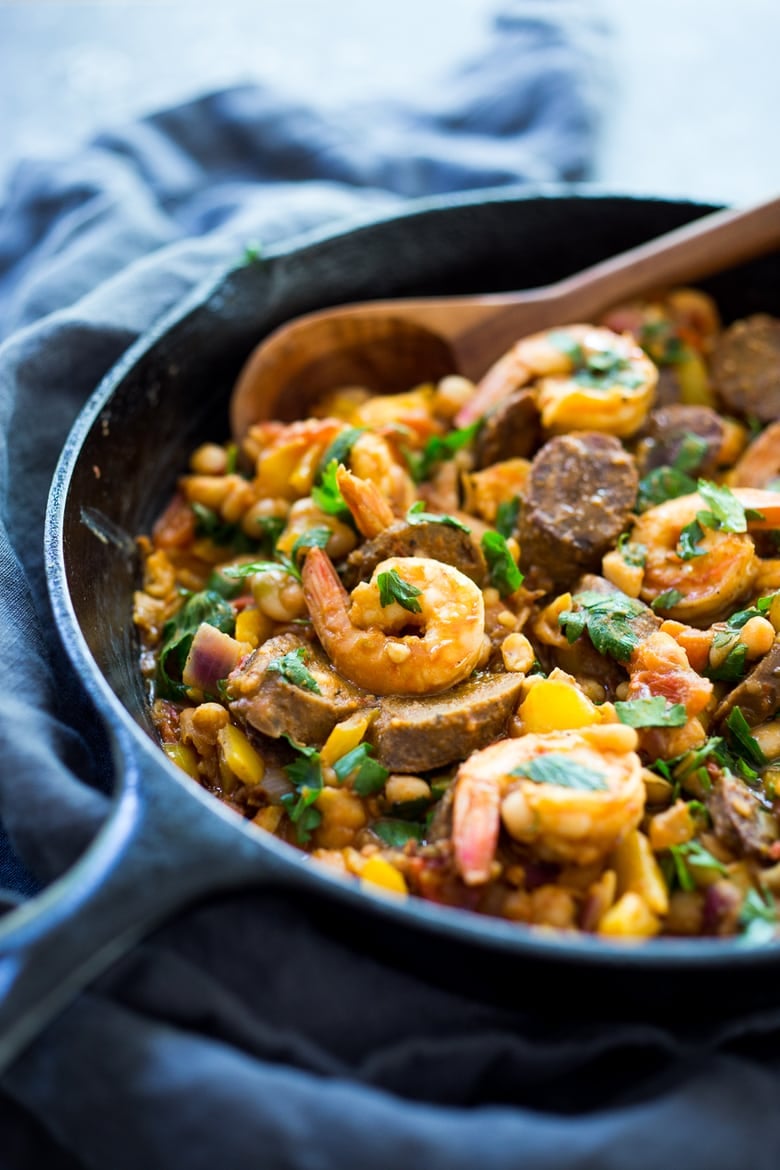 Spanish White bean, Shrimp and Sausage Skillet- a simple, healthy & flavorful, one-pan meal that can be on the table in 20 minutes! | www.feastingathome.com