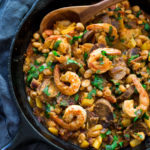 Spanish White bean, Shrimp and Sausage Skillet- a simple, healthy & flavorful, one-pan meal that can be on the table in 20 minutes! | www.feastingathome.com