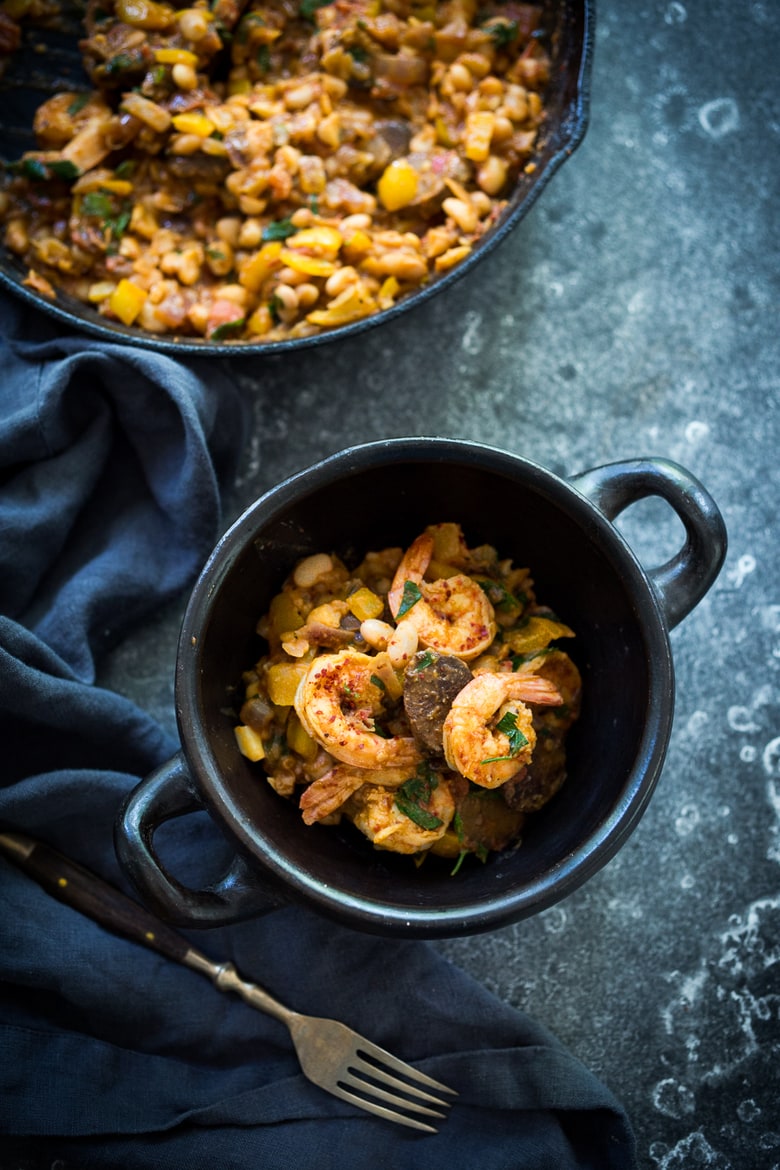 Spanish White bean, Shrimp and Sausage Skillet- a simple, healthy & flavorful, one-pan meal that can be on the table in 20 minutes! | www.feastingathome.com