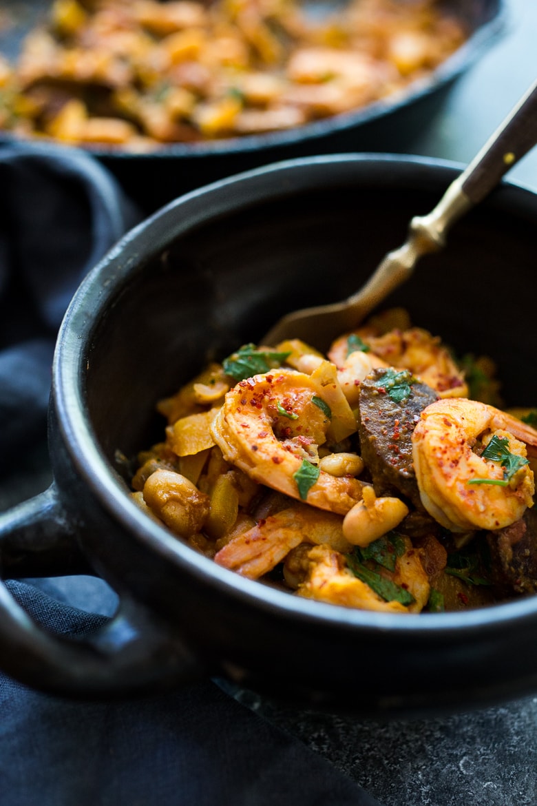 Spanish White bean, Shrimp and Sausage Skillet- a simple, healthy & flavorful, one-pan meal that can be on the table in 20 minutes! | www.feastingathome.com