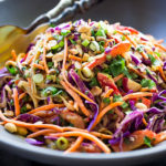 Thai Noodle Salad with Peanut Sauce- loaded up with healthy veggies and the BEST Thai Peanut Sauce EVER! Vegan & Gluten-Free | www.feastingathome.com |#thainoodlesalad #vegan #thainoodles #peanutsauce #peanutdressing #veganthainoodlesalad #vegansalad #mealprep #asiannoodlesalad #thairecipes #thaipeaunutsauce