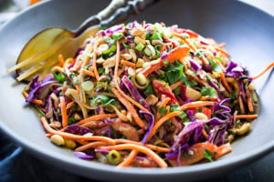 Thai Noodle Salad with Peanut Sauce- loaded up with healthy veggies and the BEST Thai Peanut Sauce EVER! Vegan & Gluten-Free | www.feastingathome.com |#thainoodlesalad #vegan #thainoodles #peanutsauce #peanutdressing #veganthainoodlesalad #vegansalad #mealprep #asiannoodlesalad #thairecipes #thaipeaunutsauce