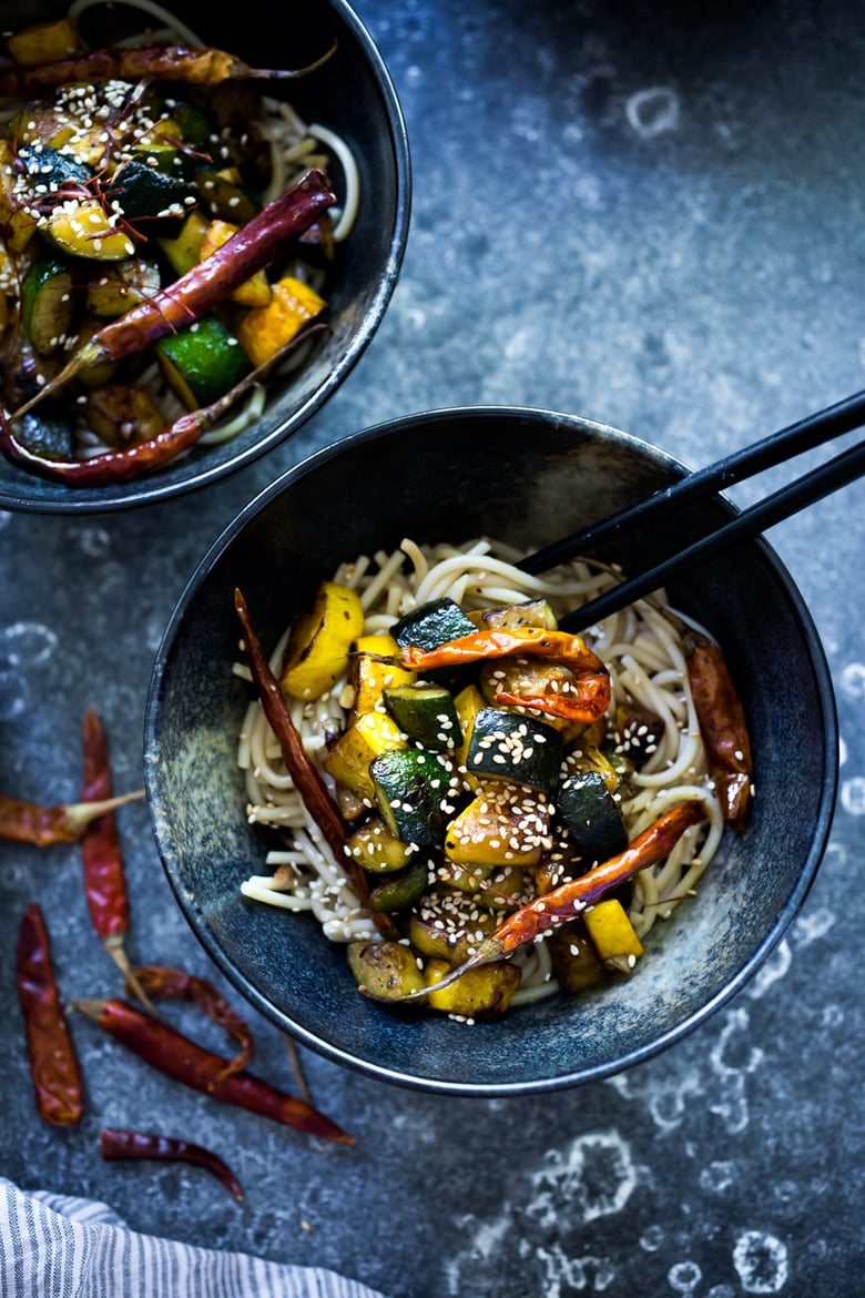 A simple delicious recipe for Kung Pao Zucchini over noodles or rice. Vegan and gluten-free adaptable! | www.feastingathome.com 