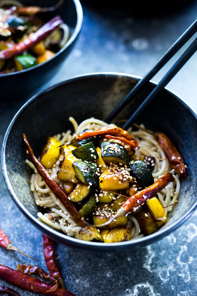 A simple delicious recipe for Kung Pao Zucchini over noodles or rice. Vegan and gluten-free adaptable! | www.feastingathome.com 