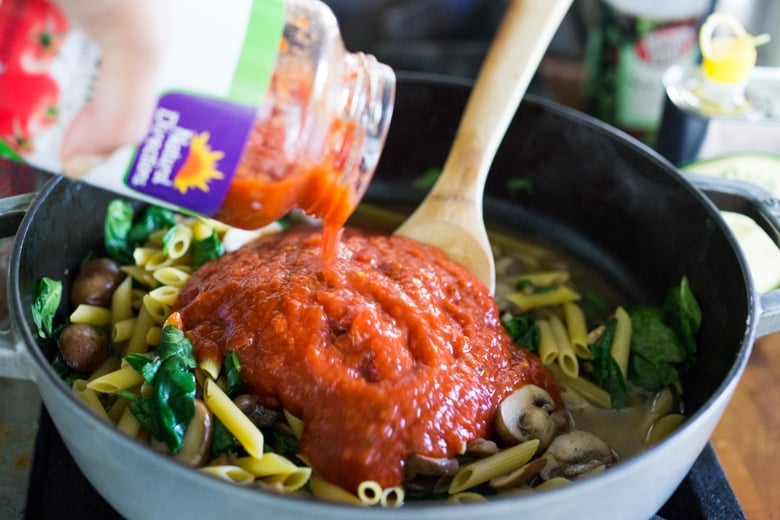 A simple, flavorful no-boil, Mushroom Baked Ziti with Spinach and Ricotta ( or sub tofu ricotta) that can be made in one pan and requires no pre-boiling of pasta. Perfect for weeknight dinners! #noboil, #ziti, #vegan | www.feastingathome.com