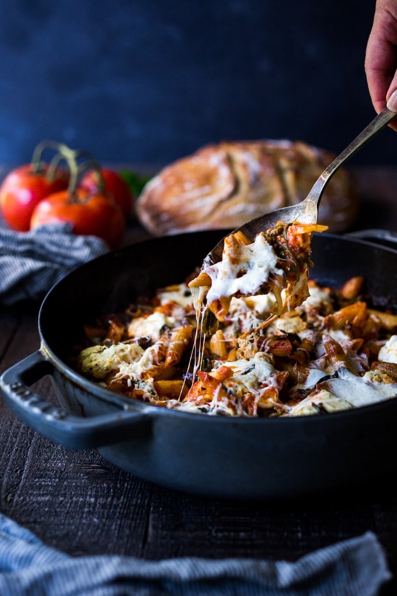 No-Boil Baked Ziti with Spinach, Mushrooms and Ricotta - a simple, healthy one-pot meal with only 15 minutes of hands-on time before baking in the oven. Vegan and GF adaptable! #onepotmeals #onepotmeal #onepanmeals #healthy #easydinner #weeknightdinner #vegan