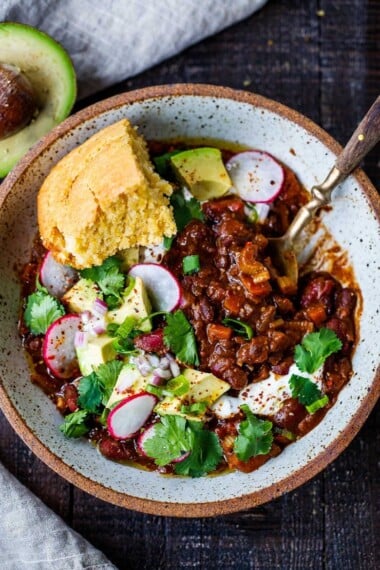 This Vegan Chili recipe is so rich and robust! Packed full of flavor, it's wholesome and hearty with layers of complexity and depth. Video.