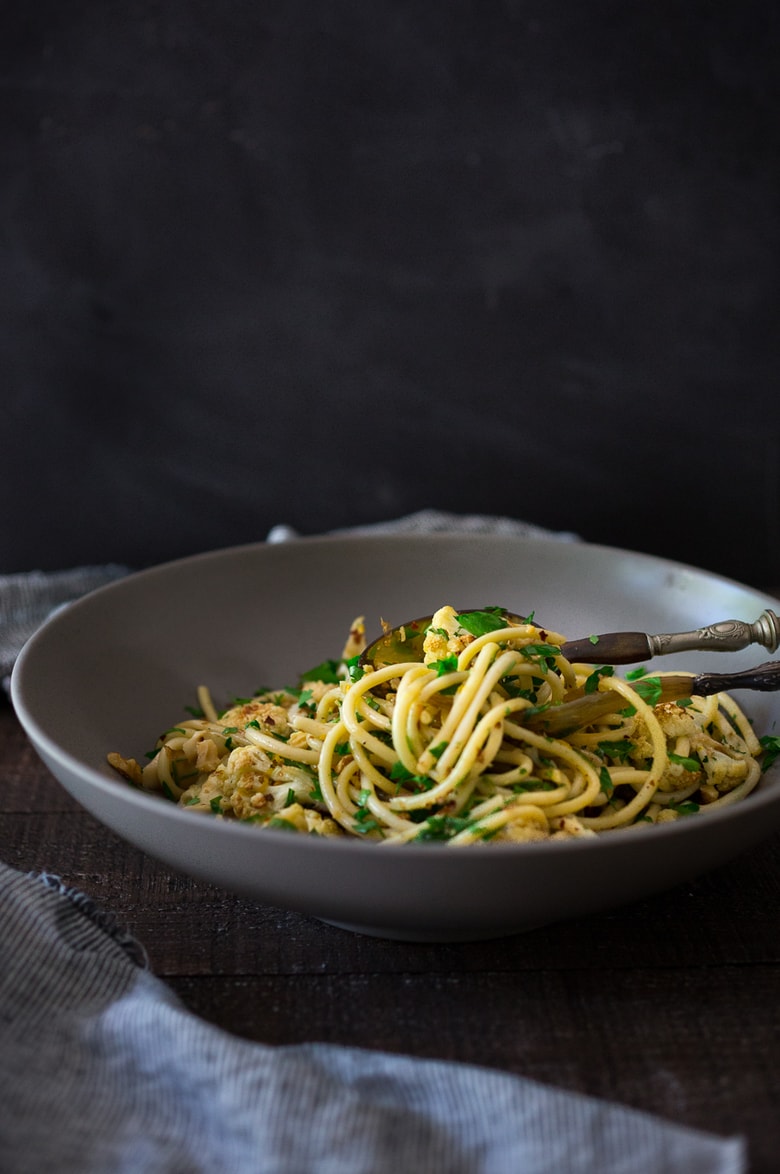 Roasted Cauliflower Pasta with Toasted Walnuts, Parsley, Garlic and Lemon Zest - a delicious vegan dinner that can be made in 30 minutes! | www.feastingathome.com