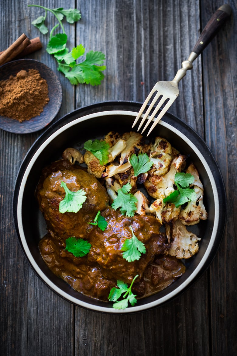 35 Mouthwatering Indian Recipes | Indian Butter Chicken (or Cauliflower) served over your choice of roasted cauliflower or brown basmati rice- a flavorful Indian Curry dish that is vegan adaptable!