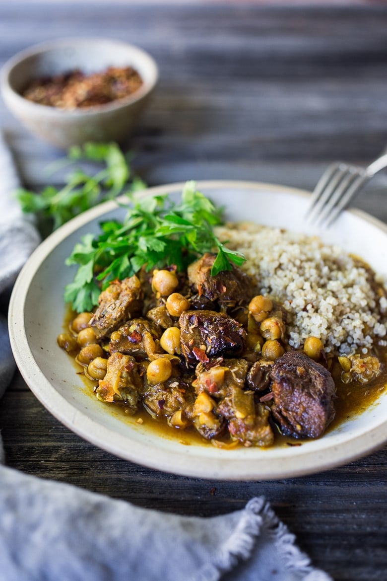 Instant Pot Middle Eastern Lamb Stew with chickpeas and fragrant spices- a simple flavorful wholesome meal. Serve over quinoa, basmati rice or cauliflower "rice". | www.feastingathome.com