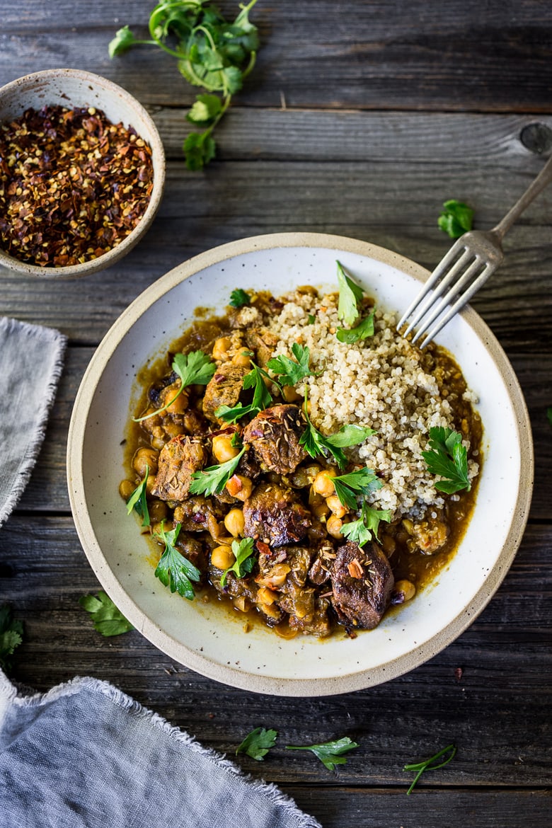Instant Pot Middle Eastern Lamb Stew with chickpeas and fragrant spices- a simple flavorful wholesome meal. Serve over quinoa, basmati rice or cauliflower "rice". | www.feastingathome.com