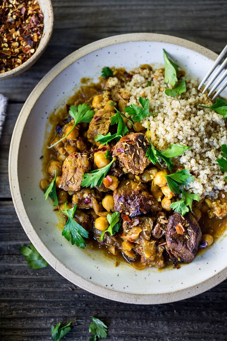 Instant Pot Middle Eastern Lamb Stew with chickpeas and fragrant spices- a simple flavorful wholesome meal. Serve over quinoa, basmati rice or cauliflower "rice". | www.feastingathome.com