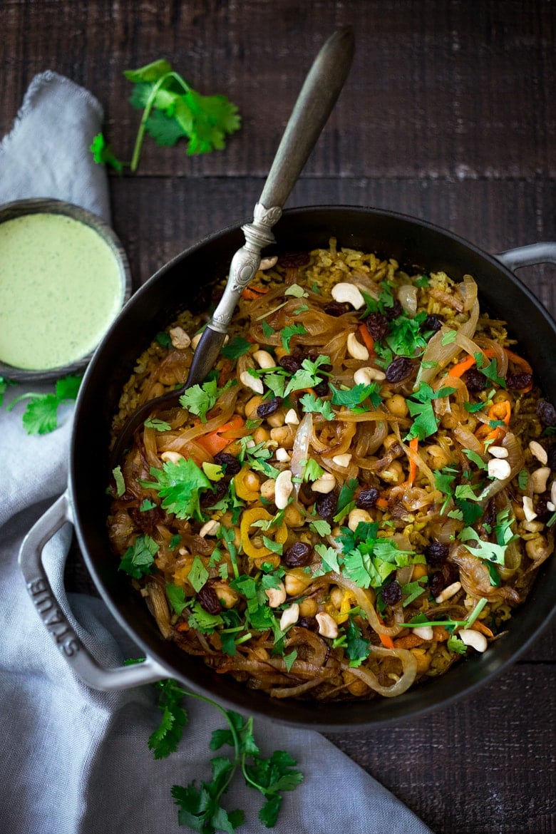 Quick and Easy Vegetarian Biryani! A fragrant Indian rice dish infused with Indian spices - vegan adaptable and gluten-free. A quick and easy weeknight meal. | www.feastingathome.com #biryani #vegandinner #veganrecipe #vegetablebiryani #veganbiryani