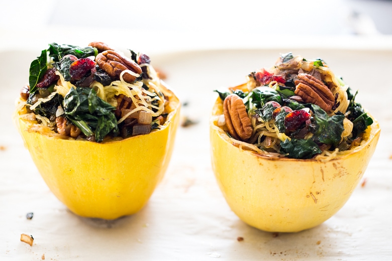  Stuffed Spaghetti Squash with Pecans, Kale and Dried Cranberries, a simple delicious weeknight meal. Vegan & GF | www.feastingathome.com