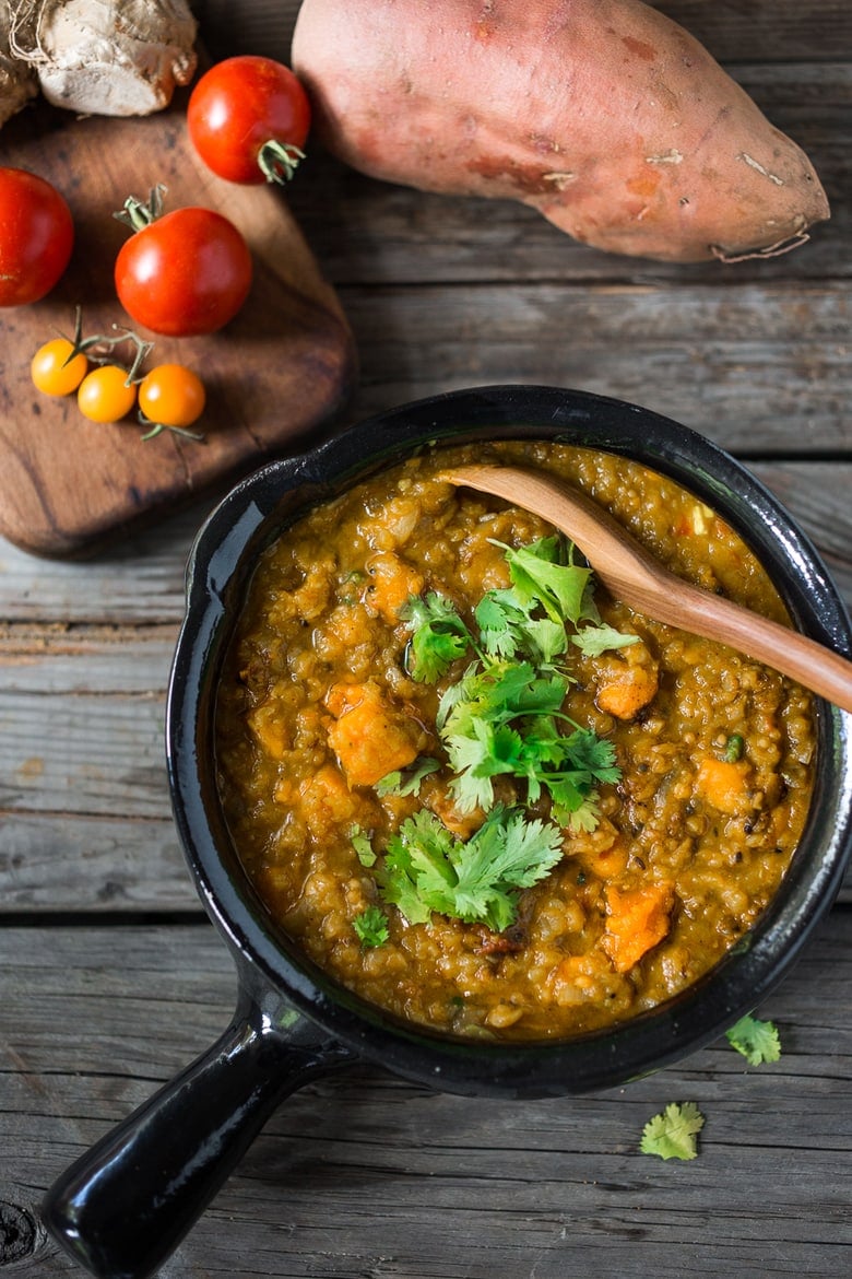 Soulful, Comforting Lentil Dal with Sweet Potatoes and a flavorful "tempering oil". A quick 30 minute meal that is simple to make and full of fragrant Indian spices. Vegetarian | www.feastingathome.com #lentils #dal #lentildal #sweetpotatoes #vegan #glutenfree