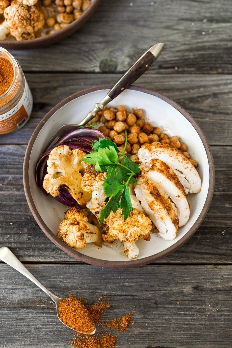 Tandoori Glory Bowl with sheet-pan roasted cauliflower, chickpeas and optional chicken, served over cinnamon scented rice. A FAST, flavorful weeknight meal! Vegan, GF | www.feastingathome.com 