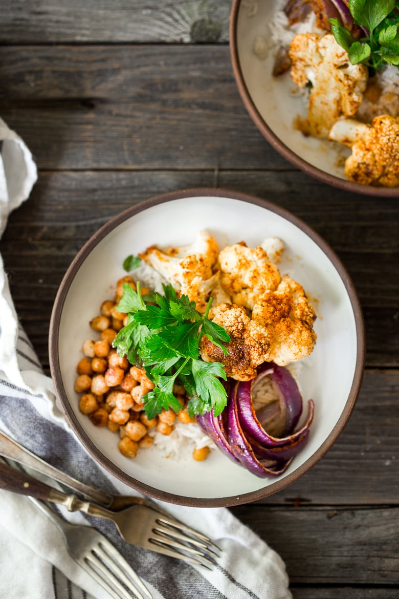 Tandoori Glory Bowl with sheet-pan roasted cauliflower, chickpeas and optional chicken, served over cinnamon scented rice. A FAST, flavorful weeknight meal! Vegan, GF | www.feastingathome.com 