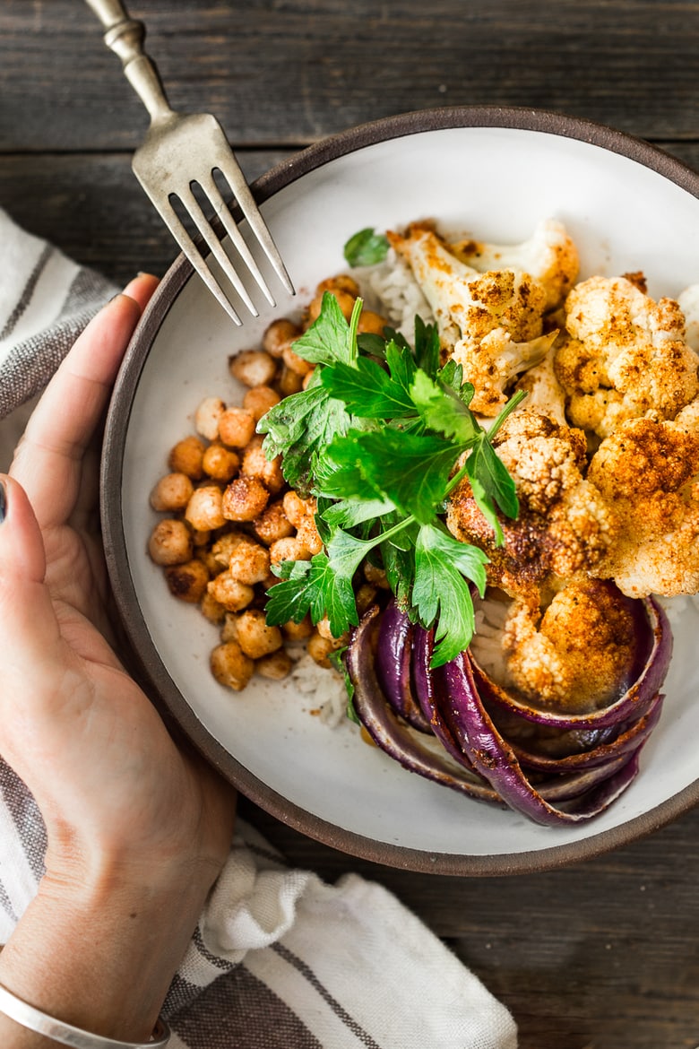 Chickpea Buddha Bowl with sheet-pan roasted cauliflower, spiced chickpeas and optional chicken, served over cinnamon-scented rice. A FAST, flavorful weeknight meal! 