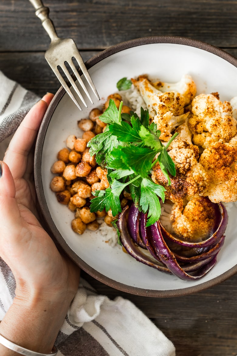 Chickpea Buddha Bowl with sheet-pan roasted cauliflower, spiced chickpeas and optional chicken, served over cinnamon-scented rice. A FAST, flavorful weeknight meal!