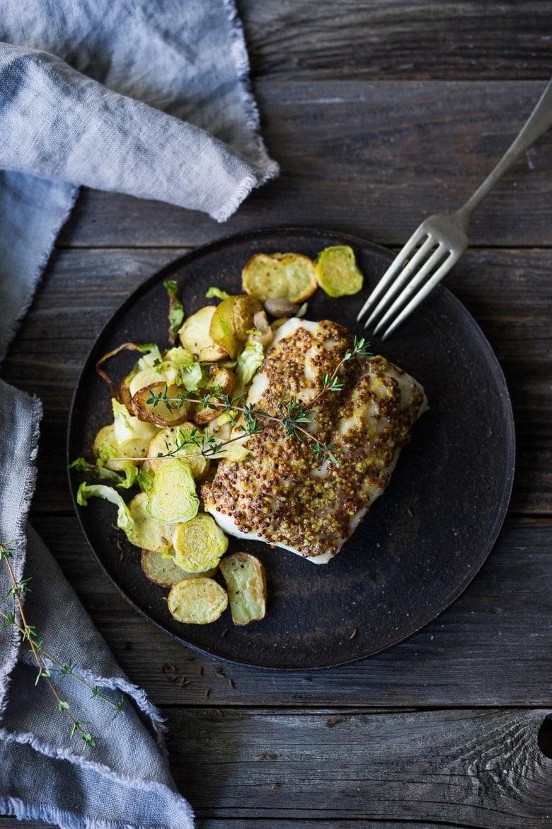 20 BEST FISH RECIPES | Feasting at Home: A simple healthy recipe for Roasted Mustard Seed White Fish with Potato-Brussel Sprout Hash, a quick and easysheet-pan dinner that is full of flavor. | www.feastingathome.com #sheetpan #onepan #brusselsprouts #mustard #whitefish #halibut #cod