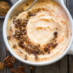 Creamy Carrot Mashed Potatoes with brown butter pecans. | www.feastingathome.com