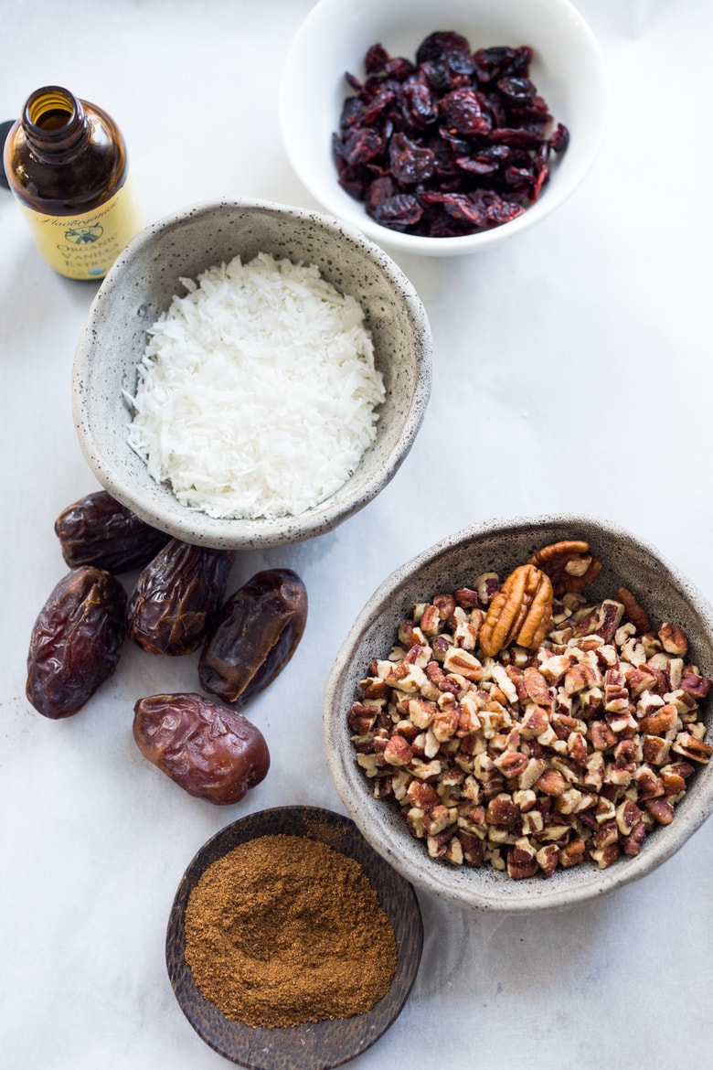 Coconut Pecan Energy Balls with Masala Spice and Dried Cranberries, a simple, tasty vegan and gluten-free snack that can be made in 10 minutes! | www.feastingathome.com