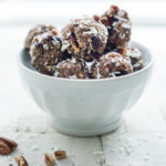 A grain-free, paleo friendly Energy Ball made with Pecans, coconut, dried cranberries and a whisper of Indian Spice. Addicting and delicious!