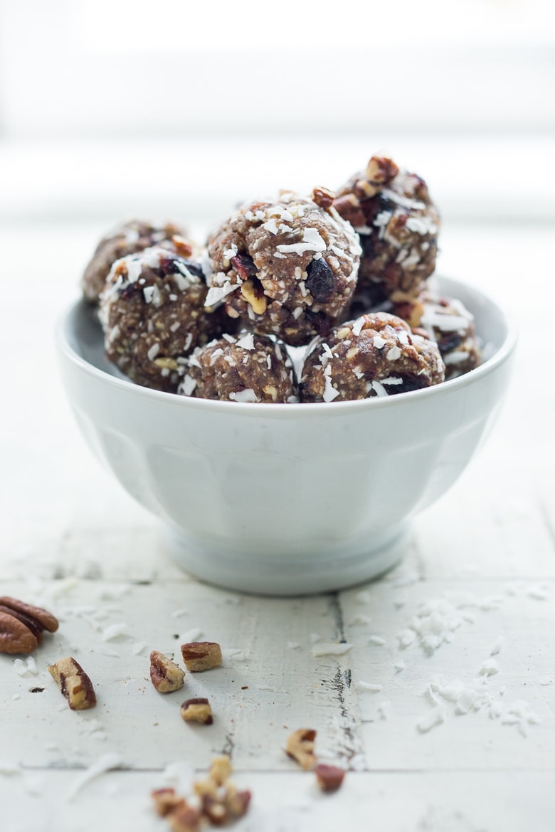 Vegan Energy Balls with coconut, pecans and Masala Spice, a simple, tasty vegan and gluten-free snack that can be made in 10 minutes! #energyballs #veganenergyballs | www.feastingathome.com #veganbreakfast #vegansnack 