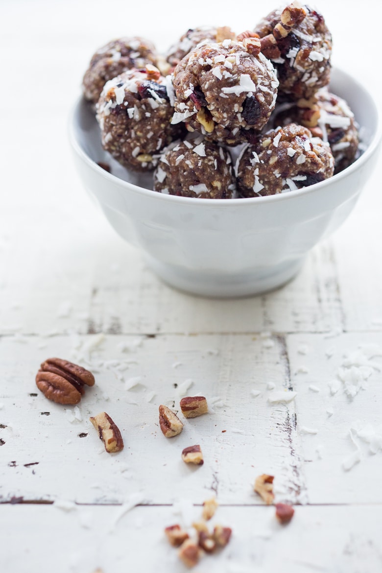 Vegan Energy Balls with coconut, pecans and Masala Spice, a simple, tasty vegan and gluten-free snack that can be made in 10 minutes! #energyballs #veganenergyballs | www.feastingathome.com #veganbreakfast #vegansnack 