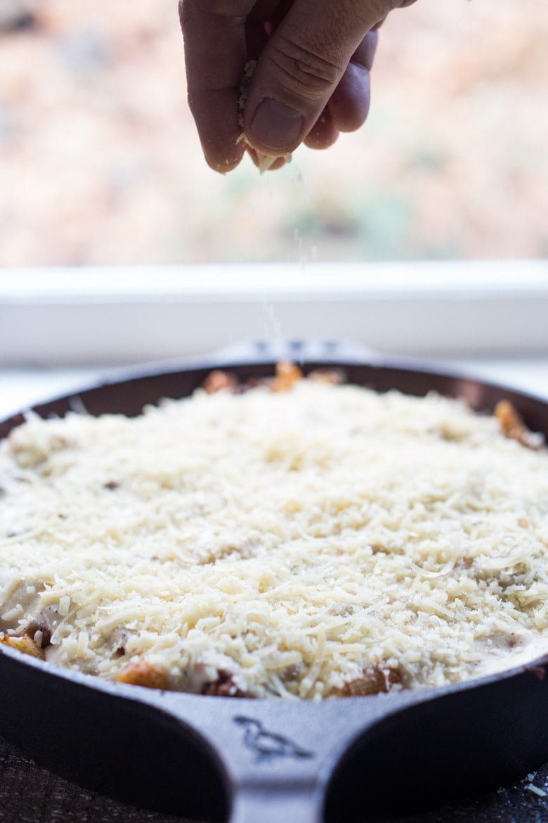 Simple authentic Greek baked pasta dish with a rich flavorful lamb (or beef) bolognese infused with Greek spices and flavors. Perfect for entertaining!