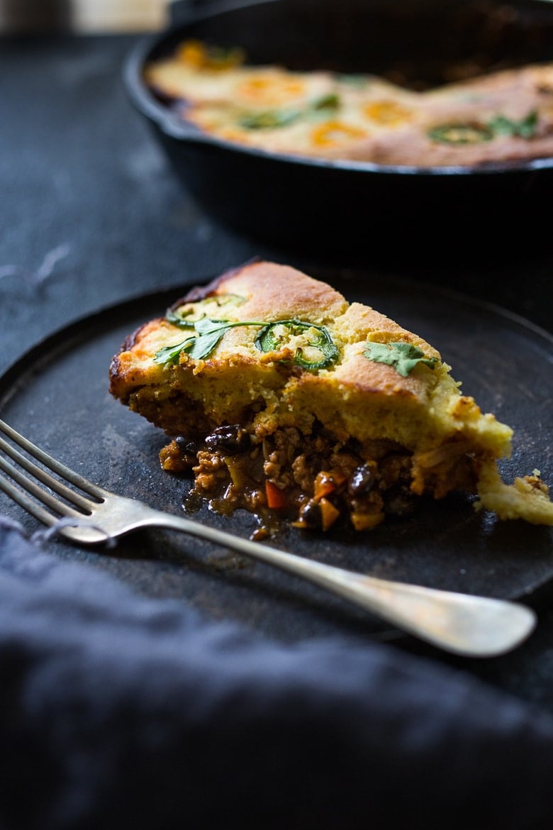 Tamale Pie with your choice of ground turkey, beef or veggie meat with seasonal veggies, topped with a delicious cornbread crust. | www.feastingathome.com 