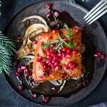 This Pomegranate Salmon recipe is so festive and delicious! Inspired by the flavors of Morocco, it is very easy to make, and worthy of your holiday table.