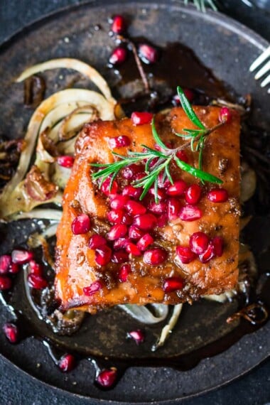 This Pomegranate Salmon recipe is so festive and delicious! Inspired by the flavors of Morocco, it is very easy to make, and worthy of your holiday table.