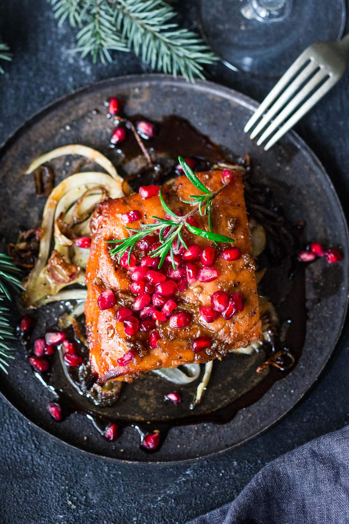 This Pomegranate Salmon recipe is so festive and delicious!  Inspired by the flavors of Morocco, it is very easy to make, and worthy of your holiday table. 