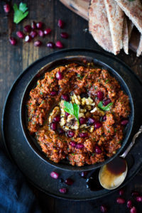 A simple, flavorful Middle Eastern-style, Roasted Red Pepper - Walnut Dip called Muhammara, with garlic, parsley and pomegranate molasses ( recipe below) , that can be made ahead in food processor. Serve with toasted pita or crackers.