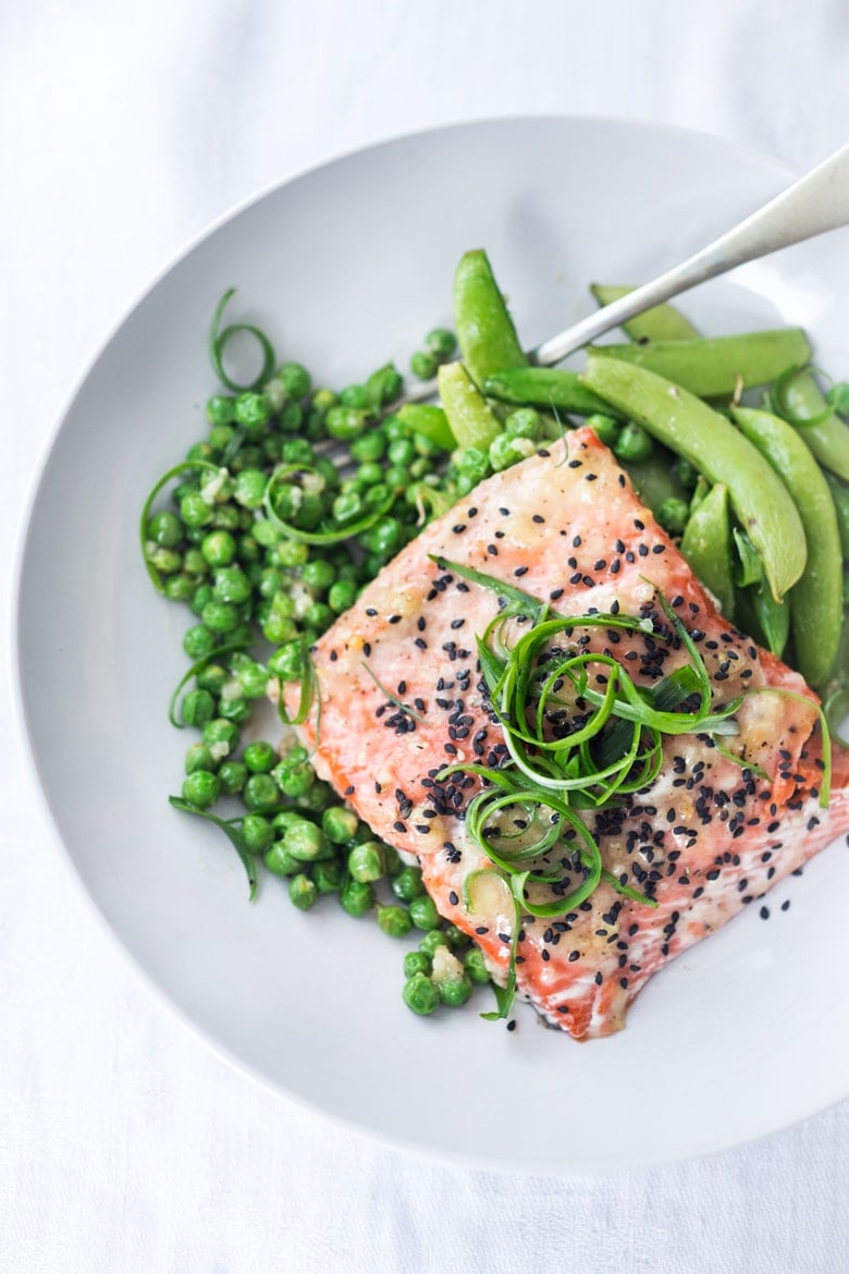 BEST Salmon Recipes | Here's a simple recipe for Sheet Pan Miso Salmon and Spring Peas - a fast and healthy weeknight dinner that can be made in under 25 minutes.