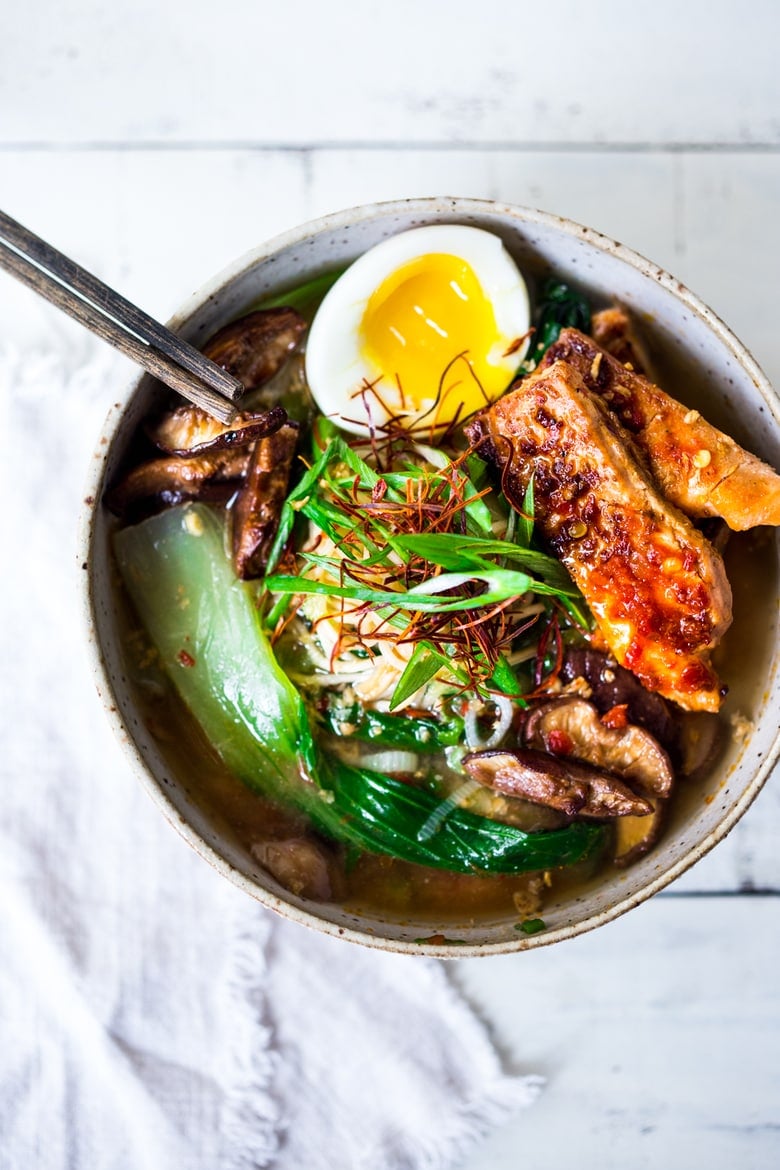 Simple Spicy Miso Ramen w/ Roasted Chili Salmon ( or tofu!) with bok choy, mushrooms and scallions. Vegan and Paleo adaptable! Swap out zucchini noodles or kelp noodles to keep it Paleo! Make in 20 minutes! | www.feastingathome.com