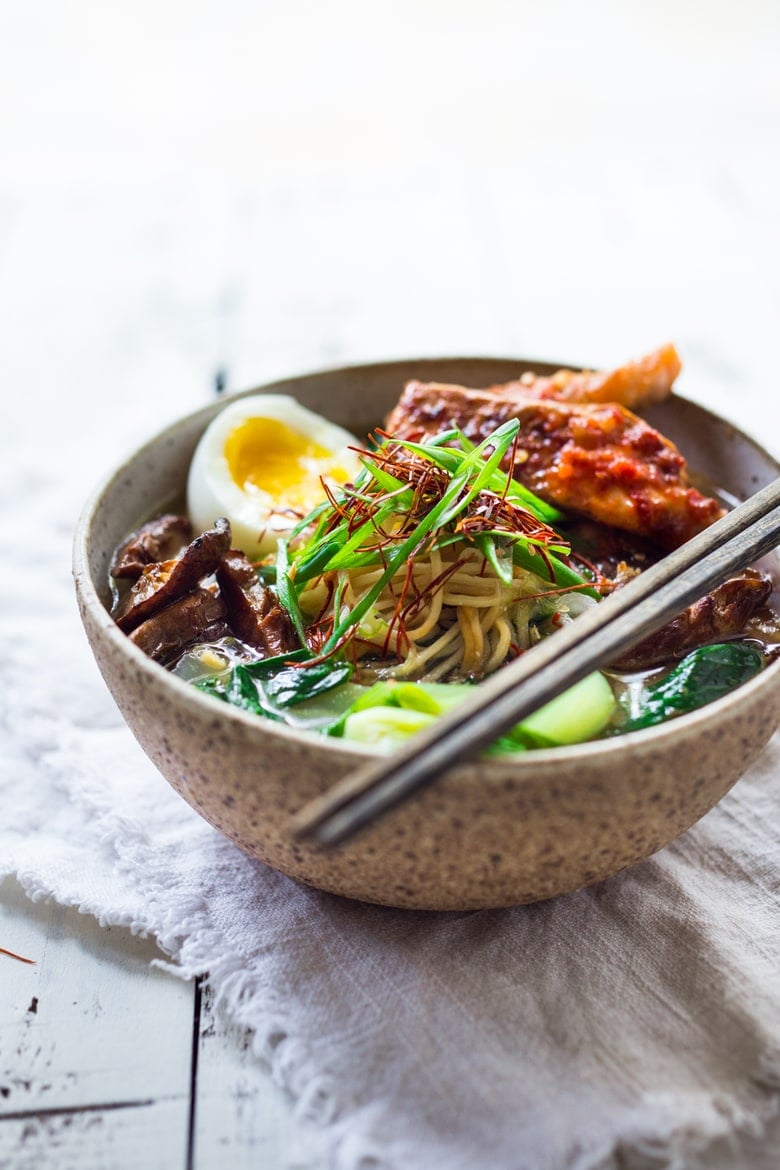 Simple Spicy Miso Ramen w/ Roasted Chili Salmon ( or tofu!) with bok choy, mushrooms and scallions. Vegan and Paleo adaptable! Swap out zucchini noodles or kelp noodles to keep it Paleo! Make in 30 minutes! | www.feastingathome.com