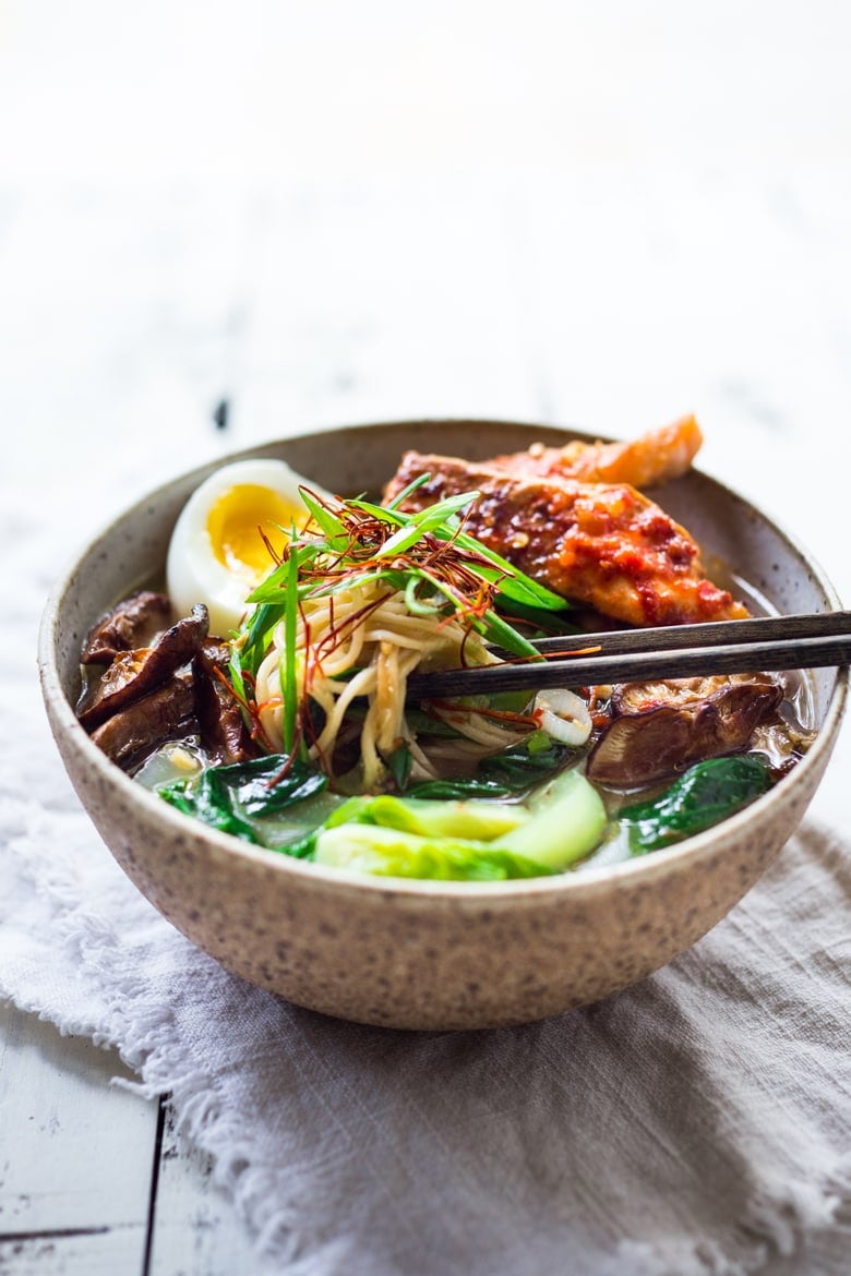 Simple Spicy Miso Ramen w/ Roasted Chili Salmon ( or tofu!) with bok choy, mushrooms and scallions. Vegan and Paleo adaptable! Swap out zucchini noodles or kelp noodles to keep it Paleo! Make in 20 minutes! | www.feastingathome.com