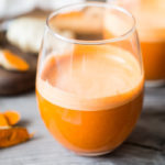 Turmeric Golden Root juice - a fresh juice harnessing the power of turmeric root - to soothe inflammation, aid in cleansing the body and fight illness. | www.feastingathome.com