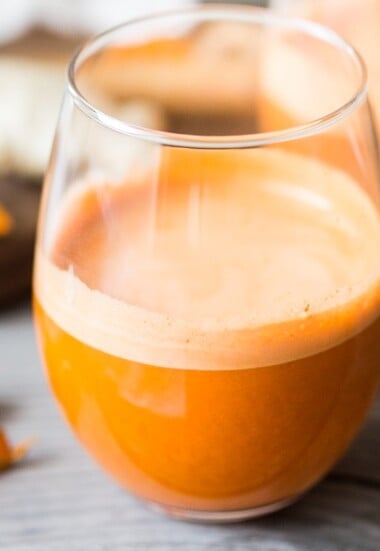 Turmeric Golden Root juice - a fresh juice harnessing the power of turmeric root - to soothe inflammation, aid in cleansing the body and fight illness. | www.feastingathome.com