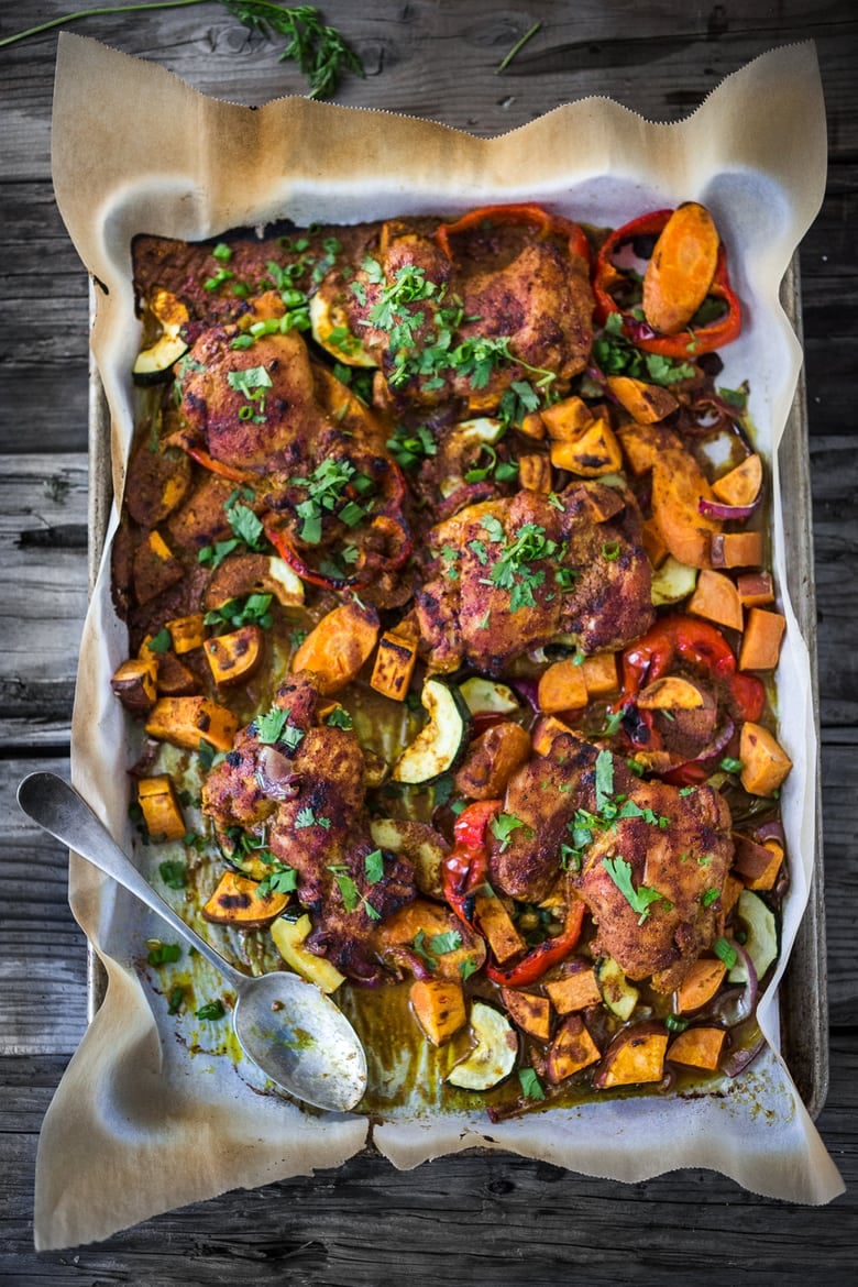 Baked Tandoori Chicken (or Tofu) with "clean-out-your-fridge veggies" and flavorful tandoori marinade, all cooked on a sheet-pan. Delicious, healthy recipe! Vegetarian Adaptable! #tandoorichicken #bakedtandoorichicken #tandooritofu