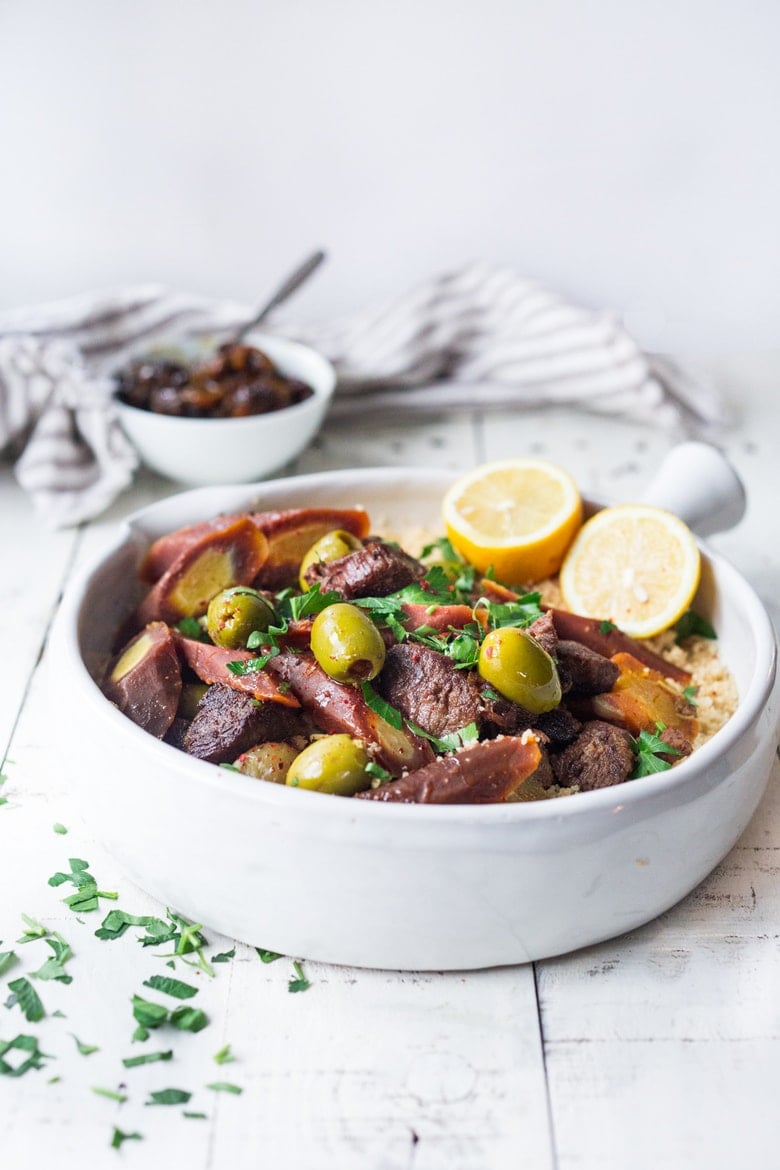 Instant Pot Lamb Tagine - meltingly tender, full of Moroccan flavors and only takes 35 minutes in the Instant Pot! | www.feastingathome.com #instantpot #lamb #lambtagine #lambstew 