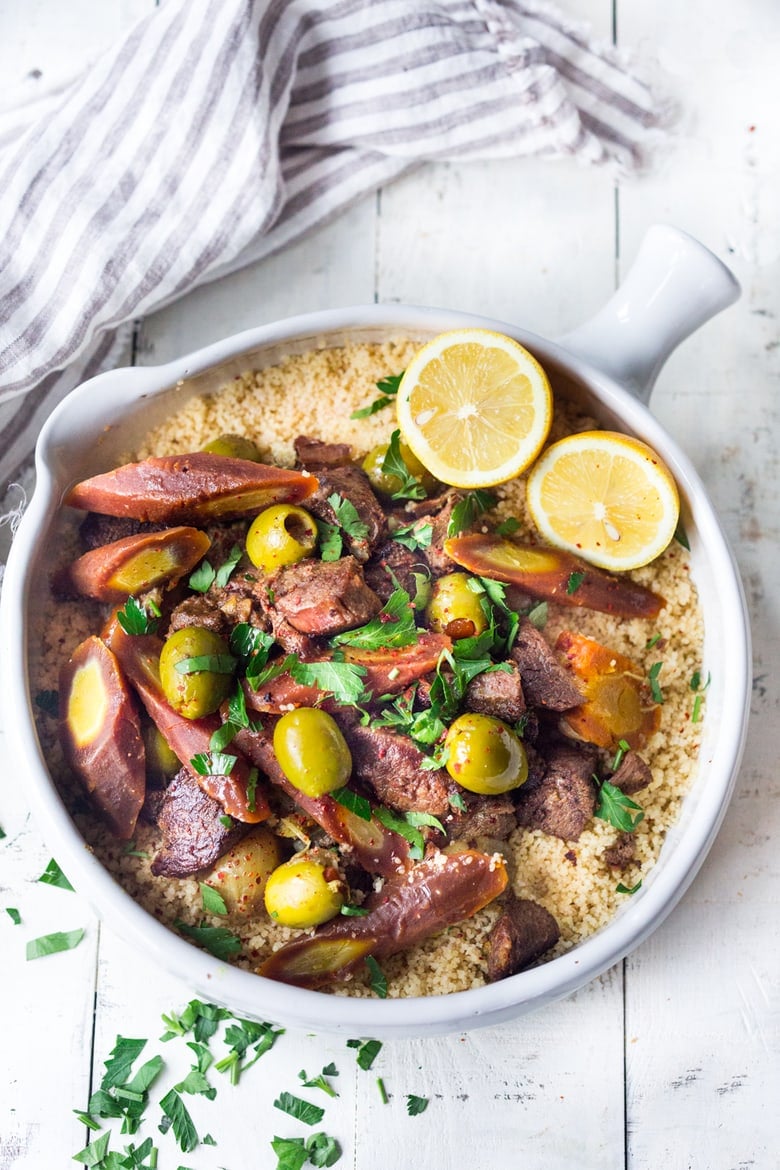 Instant Pot Lamb Tagine - meltingly tender, full of Moroccan flavors and only takes 35 minutes in the Instant Pot! | www.feastingathome.com #instantpot #lamb #lambtagine #lambstew 