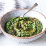 Zhoug Sauce Recipe - a flavorful Israeli Green Chili Sauce that gives meals a burst of flavor. Simple easy recipe that can be made in 5 minutes flat! | www.feastingathome.com